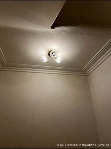 Triple adjustable spotlight plate installed on a corniced ceiling