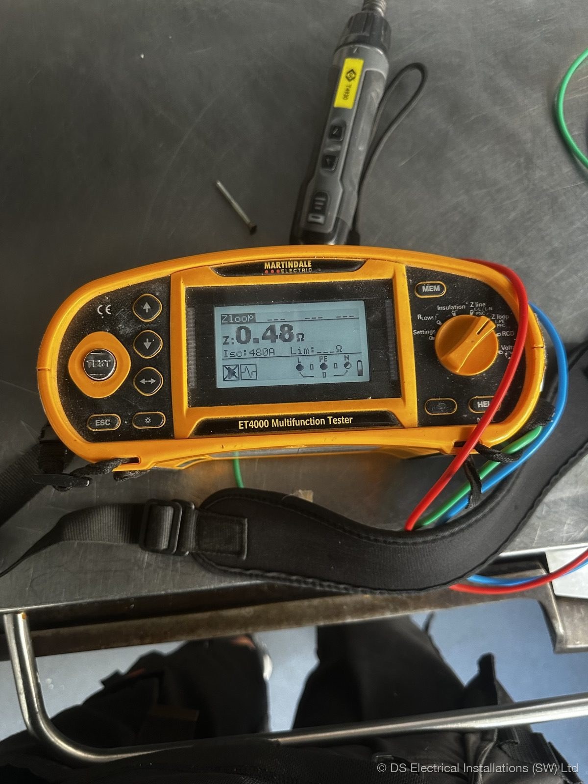 Martindale ET4000 multifunction tester showing a 0.48 ohm loop impedance reading during an EICR