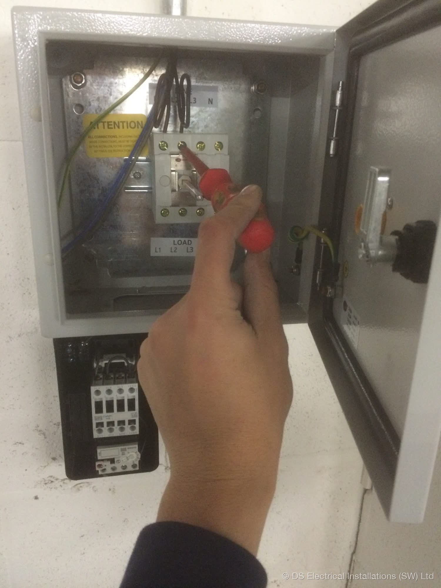 Three-phase rotary isolator and contactor in a wall-mounted enclosure, installed by DS Electrical Installations (SW) Ltd